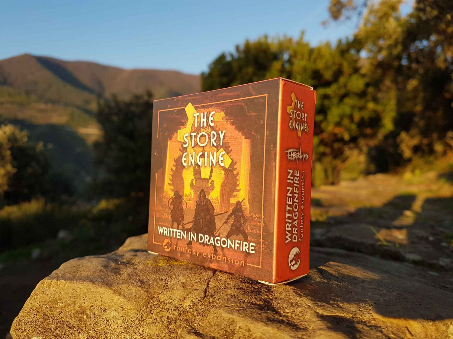 Fantasy writing prompts expansion resting on a stone at sunset